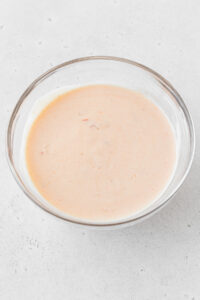 Bang bang shrimp sauce mixed together in a glass bowl.