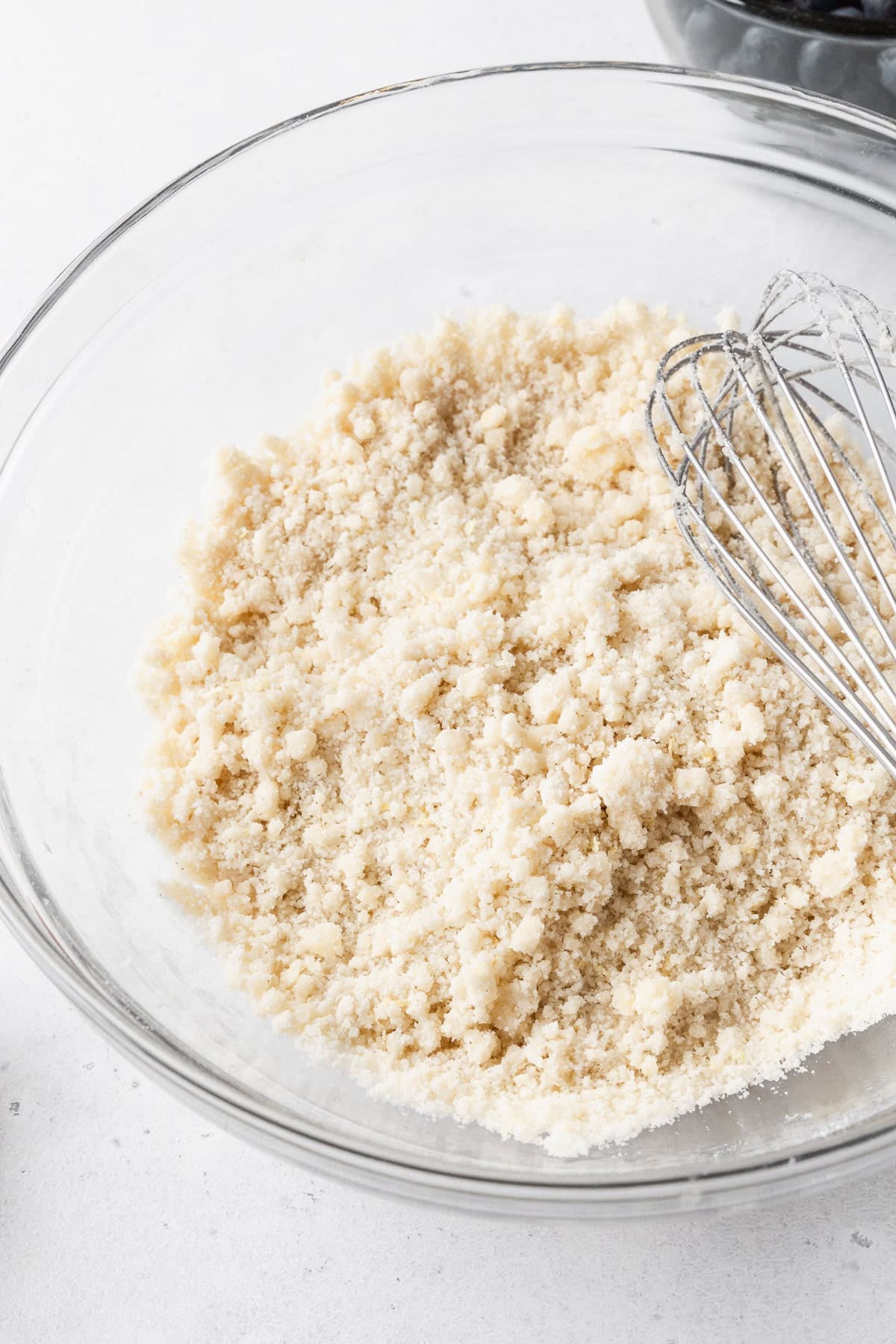 Dry ingredients in a glass bowl.