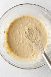 A bowl of oatmeal pancake batter.